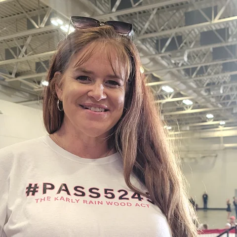 VINA founder Amber Wood wearing a #PASS5245 Karly Rain Wood Act shirt.